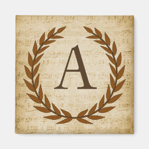 Imán Laurel Wreath sobre el monograma del papiro A inic