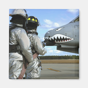 Imán Los bomberos despliegan una manguera de bomberos