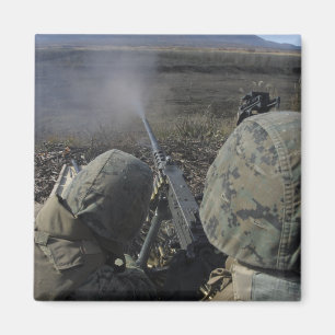 Imán Los marines disparan una ametralladora de calibre