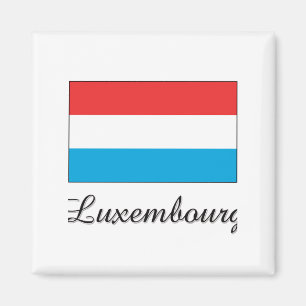 Imán Luxemburgo señala diseño por medio de una bandera