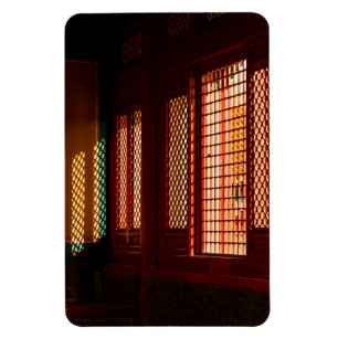 Imán Luz a través de las aberturas de la ventana de mal