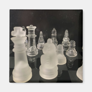 Imán Magnet with chess image. Black background.