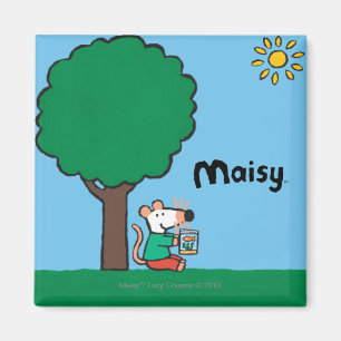 Imán Maisy lee su libro de la biblioteca afuera