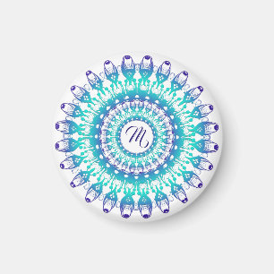 Imán Mandala verde azulada étnica. inicial. 