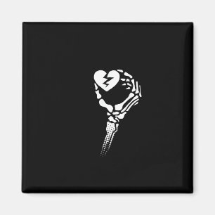 Imán Mano de esqueleto sosteniendo el corazón