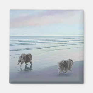 Imán Manos en la pintura de perro en la costa