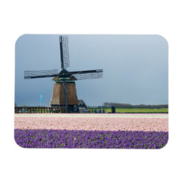 Imán Molino de viento tradicional con flores rosadas y 