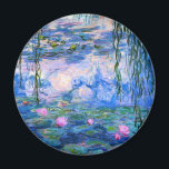 Imán Monet Water Lilies Magnet<br><div class="desc">Imán de los Alilies de Agua Monet. Pintura de óleo sobre lienzo de 1916. Monet pintó su famoso estanque de nenúfares obsesivamente durante los últimos años de su carrera, inspirándose en la luz del sol y su efecto cambiante sobre el agua y las flores acuáticas y el follaje. Este cuadro...</div>