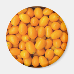 Imán Montón de kumquats anaranjados en caja de cartón