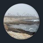 Imán Morro Bay California Coastal Photography<br><div class="desc">A foggy overcast day in Morro Bay California with the ocean waves hitting the rocks on the shore in this beach photograph souvenir. This seaside travel photo keepsake magnet features black cursive script above the beach rocks and grey sky.</div>