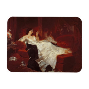 Imán Mujer en un sofá rojo