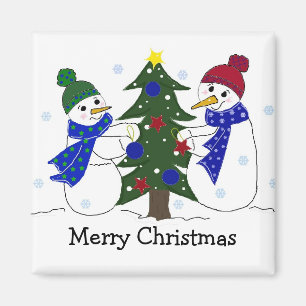 Imán Muñecos de nieve decorando un árbol de Navidad