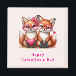 Imán Naranjas zorros curos en el El día de San Valentín<br><div class="desc">imán el día de San Valentín con una adorable imagen de dos zorros usando lindas gafas de corazón teñidas de rosa. Decorada con acentos cardíacos.</div>