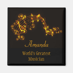 Imán Negro y notas musicales que remolinan del oro