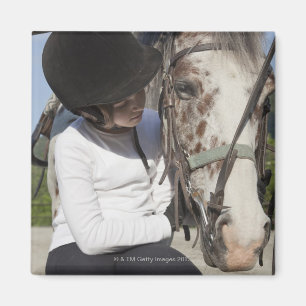 Imán Niña pequeña con su caballo