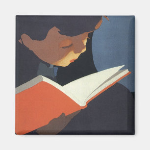 Imán Niño de la época leyendo un libro de la biblioteca