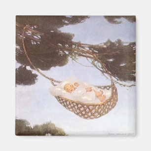 Imán Niño en el árbol de Hassoc de Jessie Willcox Smith