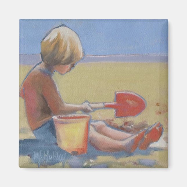 Imán Niño jugando en la arena con una pala (Frente)