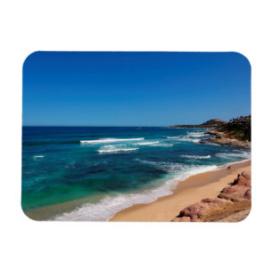 Imán Opinión aérea los turistas que caminan en la playa