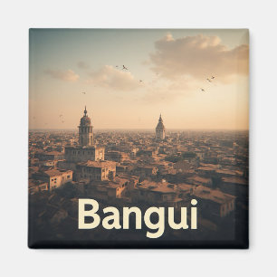 Imán Paisaje urbano de Bangui a la hora dorada con torr