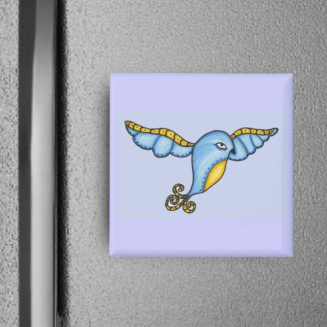 Imán Pájaro Azul En El Magnate De Vuelo (Flying fantasy bluebird with yellow scrolled tail on blue square magnet.)