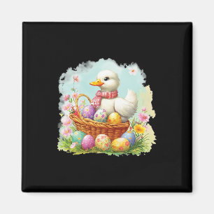 Imán Pato blanco en un cesto lleno de huevos de Pascua;