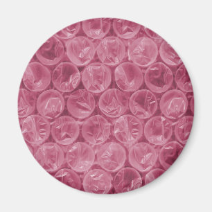Imán patrón de burbujas de plástico rosado