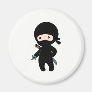 Imán Pequeño ninja sosteniendo estrella arrojadiza