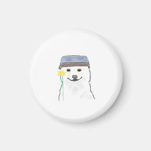 Imán Perro blanco lindo que lleva sombrero sosteniendo