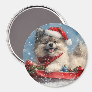 Imán Perro Keeshond en la manga que nieva a los Navidad