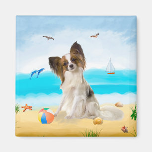 Imán Perro Papillon en la playa