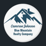 Imán Personalizado de marketing de la empresa inmobilia<br><div class="desc">Un fantástico imán de una empresa inmobiliaria de cordillera para un negocio inmobiliario ubicado en una ciudad o ciudad montañosa. El nombre del realtor está escrito en azul marino bajo la casa entre montañas. Excelente producto de marketing para un constructor casero de montaña.</div>