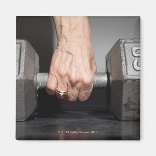 Imán Pesos de elevación de la mujer mayor