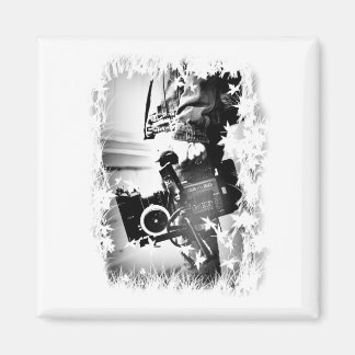 Imán Pessoa Segurando uma câmera dslr Preta