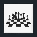 Imán Piezas negras de ajedrez en un tablero<br><div class="desc">Piezas de ajedrez negras dispuestas en un tablero de ajedrez</div>