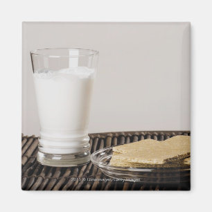 Imán Placa de bocados con un vidrio de leche