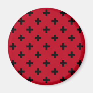 Imán Polka negro cruza en rojo