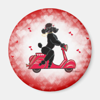 Imán Poodle negro en un corazón rojo