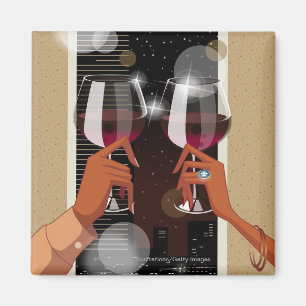 Imán Primer de un par que tuesta con las copas de vino