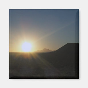 Imán puesta de sol en el desierto.