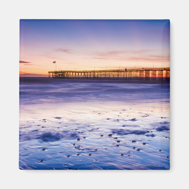 Imán Puesta de sol sobre el muelle y la playa de Ventur (Frente)