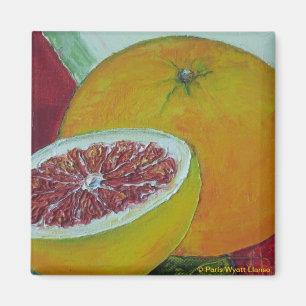Imán rojo del refrigerador del pomelo