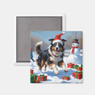 Imán Rough Collie corriendo en la nieve con sombrero de
