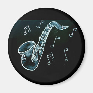 Imán Saxofón y notas musicales