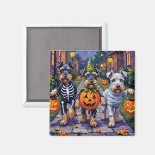 Imán Schnauzer pidiendo dulces con disfraces de Hallowe