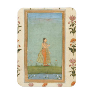 Imán Señora sosteniendo una flor, parada junto a un est