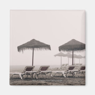 Imán Sunbeds y paraguas en la playa de Playamar