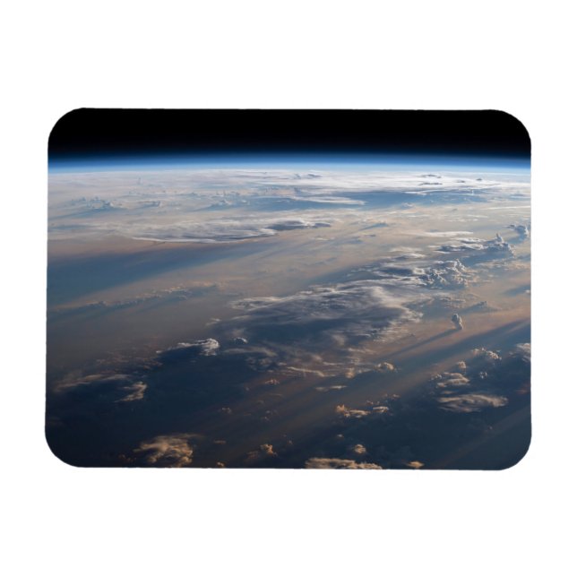 Imán Sunrise arroja largas sombras sobre el mar de Fili (Horizontal)