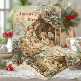 Imán tarjeta de Navidad con el niño Jesús en un pesebre