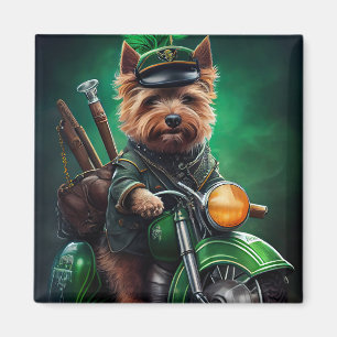Imán Terrier australiano conduciendo bicicleta Día de S